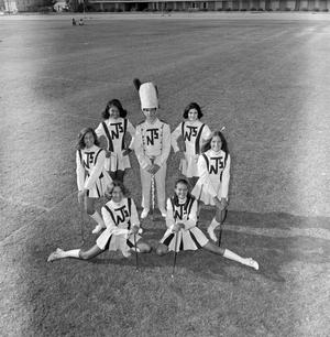 [Photograph of a drum major and majorettes #5]