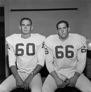 [Two football players with shoulder pads, 5]
