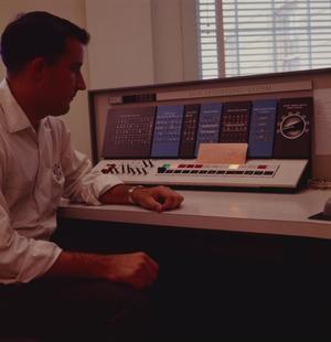 [Man sitting in front of an IBM 1620, 5]