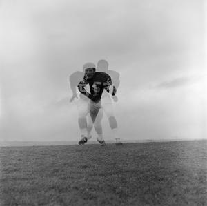 [Football player on a hill, 10]