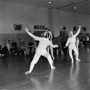 [Women fencing in Physical Education, 8]