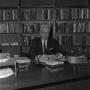 Photograph: [Dr. L.F. Connell at his desk, 9]