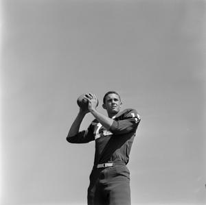 [Football player throwing a football, 2]