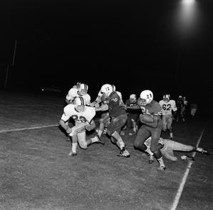 [Football game against Memphis State, 3]