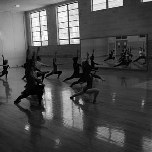 [Dancers showing flexibility]