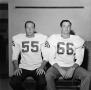 Photograph: [Two football players with shoulder pads, 16]