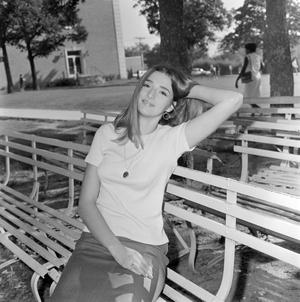 [Jane Warriner posing on benches]