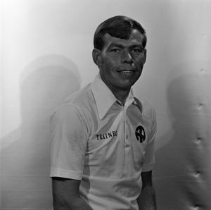 Primary view of object titled '[NTSU football trainer smiling]'.