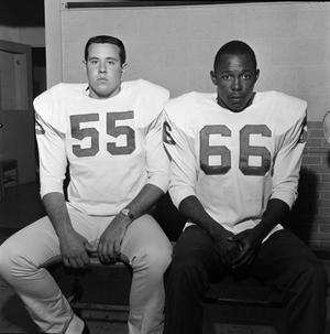 [Two football players with shoulder pads, 3]