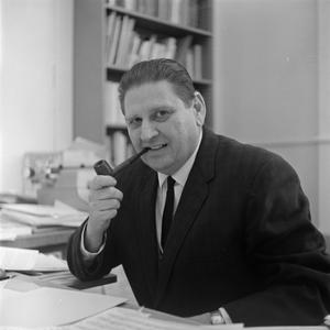 [Photograph of Dr. Friedsam at his desk #1]