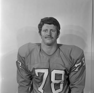 [Football player with a mustache sitting, 10]