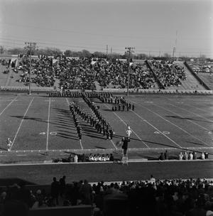 Primary view of object titled '[NT marching band on the football field]'.