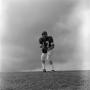 Photograph: [Football player holding the ball, 7]