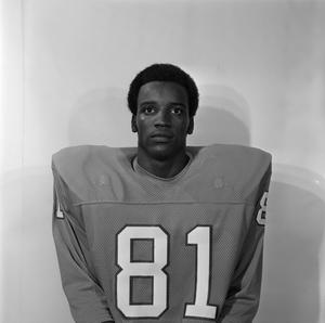 [Football player sitting for a portrait, 10]