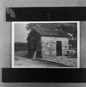 [Photograph of a log cabin #5]