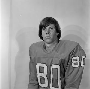 [Football player sitting for a portrait, 2]