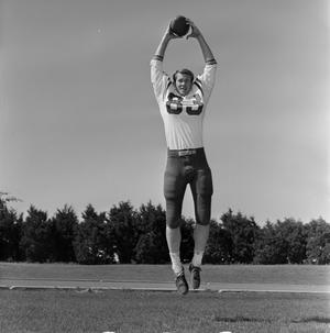 [Football player number 83 jumping, 2]