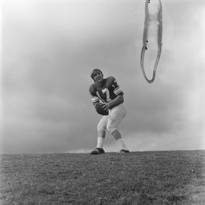 [Football player holding the ball, 6]