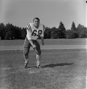 [Football player number 68 in a field, 3]