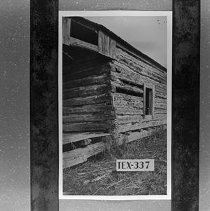 [Photograph of a log cabin #2]