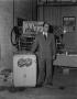 Photograph: [Man posing with Bireley's products]