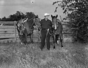 [Ted Gouldy with horses, 3]