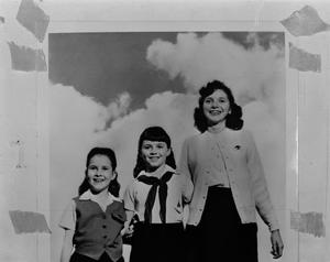 [Three girls and clouds]