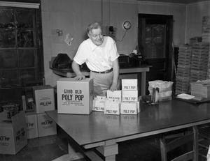 [Paul Hollis with poly pop products]