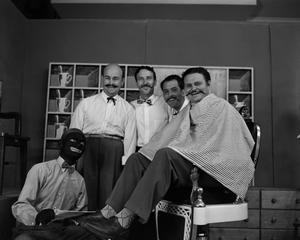 [Five men on barbershop set, one in blackface]