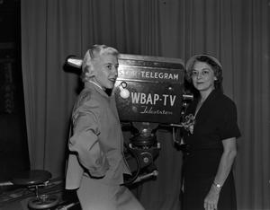 [Two women with TV camera]