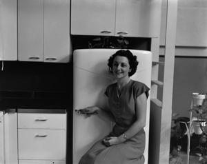 [Margaret McDonald with fridge]