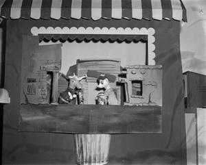 [Western town scene from the Dean Raymond Puppet Show]