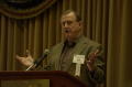 Photograph: [Billy Joe "Red" McCombs guest speaking at TDNA conference, 3]