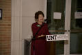 Photograph: [Dr. Mary Harris at podium]