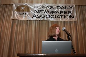 [Sharon Grigsby giving speech at TDNA conference]