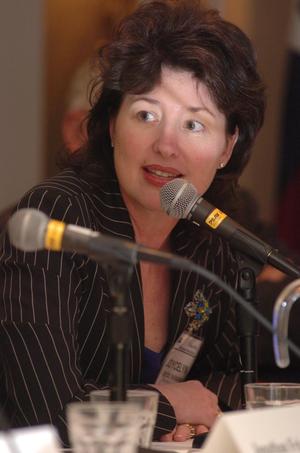 Primary view of object titled '[Joycelyn Marek speaking into microphone during panel]'.