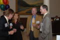 Photograph: [TDNA conference guests talking over drinks]