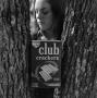 Photograph: [Club Crackers box in a tree]