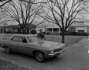 Primary view of object titled '[Roy Eaton and WBAP News car]'.