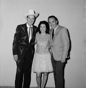 [Ernest Tubb, Loretta Lynn and Bill Mack backstage at Panther Hall]