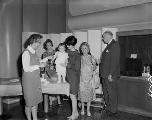 [Women, man, and child at WBAP Radio 46th Anniversary]