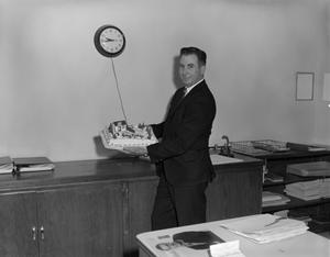 [Bob Walsh holding his birthday cake]