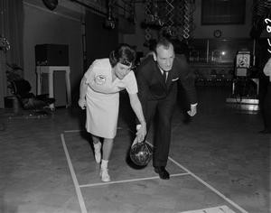 [Pete Talmadge and Woman bowling]