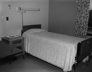 [A bed at the maternity home]