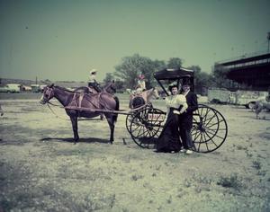 [Freda and Bob with horse and buggy]