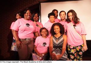 [Kimberly Elise poses with audience members]