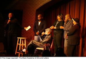 [Photograph of Curtis King on stage with Barbara Steele, Isabell Cottrell, Melvin Van Peebles, and others]
