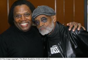 [Photograph of Curtis King and Melvin Van Peebles posing for a picture]