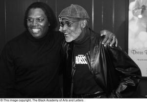 [Photograph of Melvin Van Peebles and Curtis King posing for a picture]
