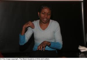 Primary view of object titled '[LisaGay Hamilton gesturing her hands while talking]'.